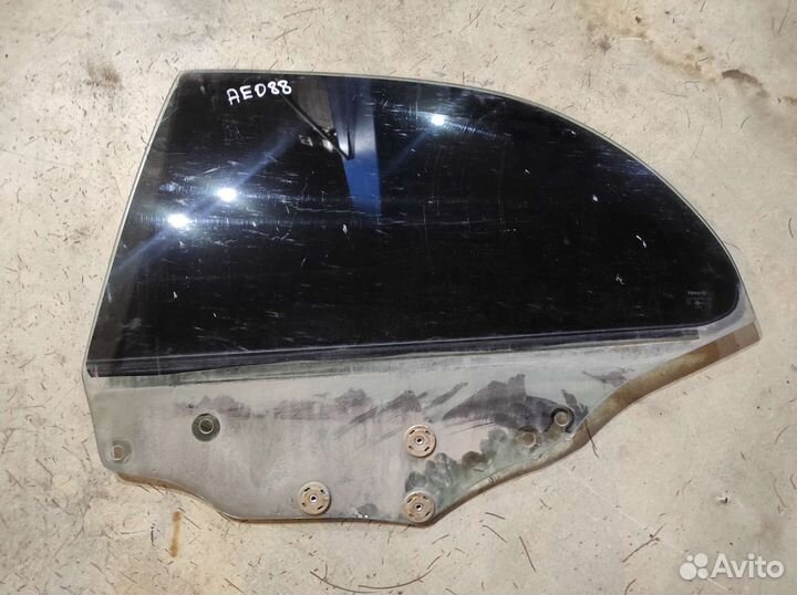 Стекло заднее левое Toyota Sprinter Marino ае101