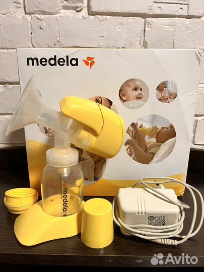 Молокоотсос medela электрический