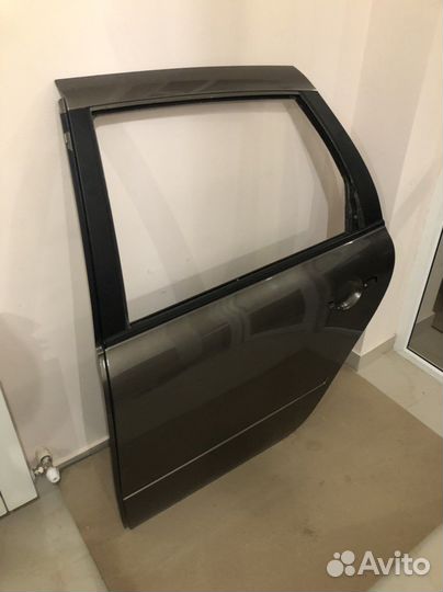 Дверь задняя левая лада грана