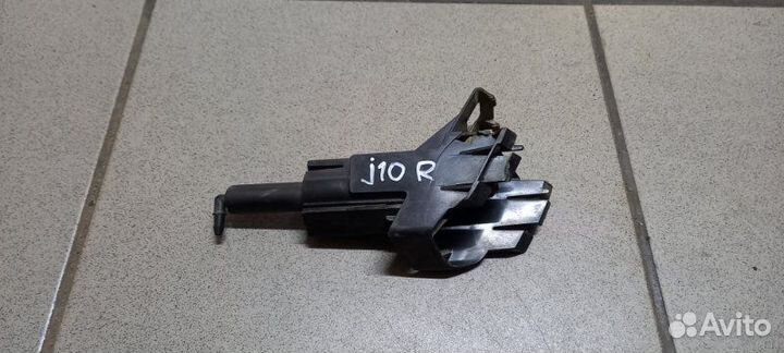 Форсунка омывателя фар передняя правая Nissan