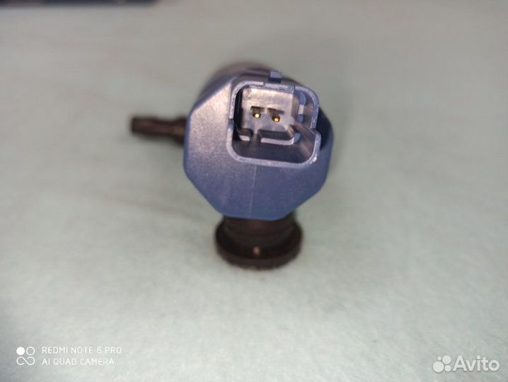 Насос омывателя фар Nissan Almera N16 QG18DE