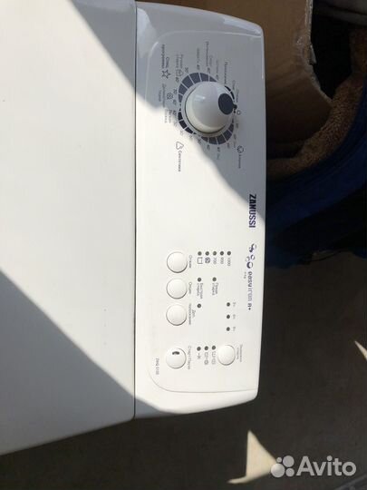 Стиральная машинка с вертикальной загрузкой