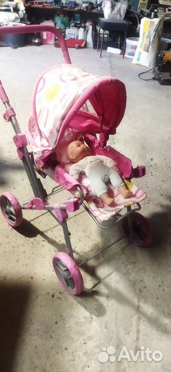 Детская игрушечная коляска