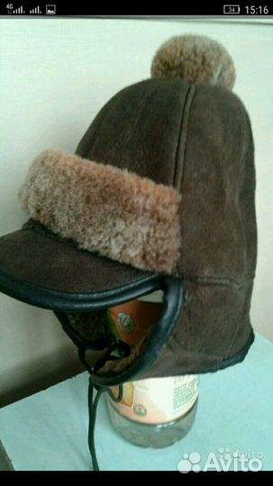 2 меховые шапки и меховые рукавички.Цена за всё
