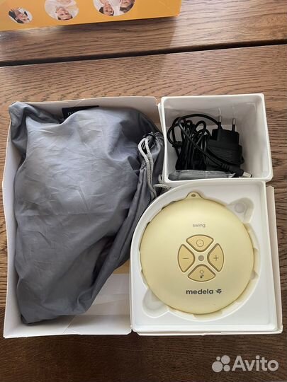 Молокоотсос medela электрический