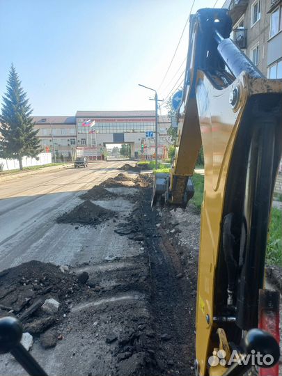 Экскаватор погрузчик caterpillar