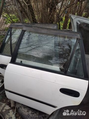 Двери на toyota corolla AE 100