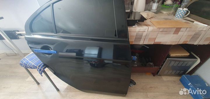 Дверь правая задняя Х42 Mitsubishi Lancer 10