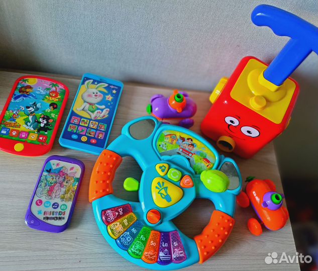 Игрушки пакетом Руль музыкальный, телефоны