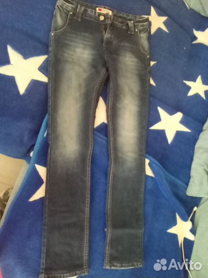 Джинсы новые