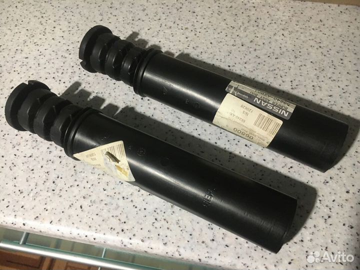 Пыльник амортизатора nissan 55240-AX601 micra 02-1