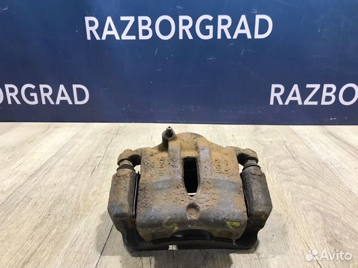 Суппорт передний правый Kia Sportage 3 2.0 G4KD