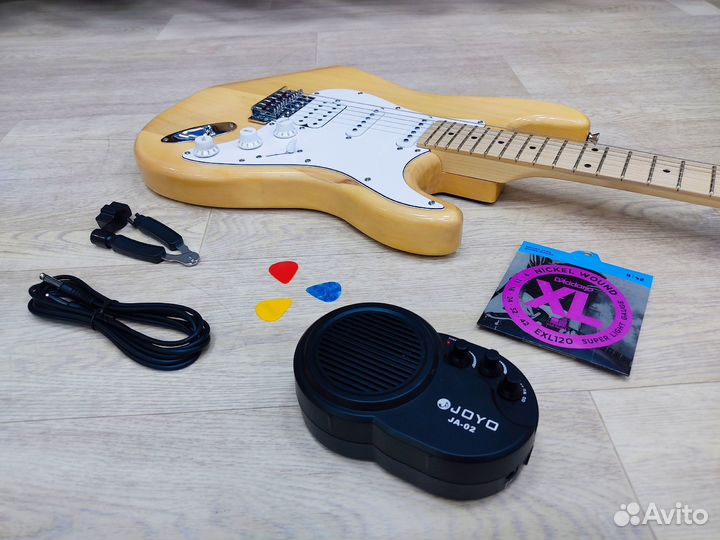 Электрогитара новая + комбоусилитель + аксессуары