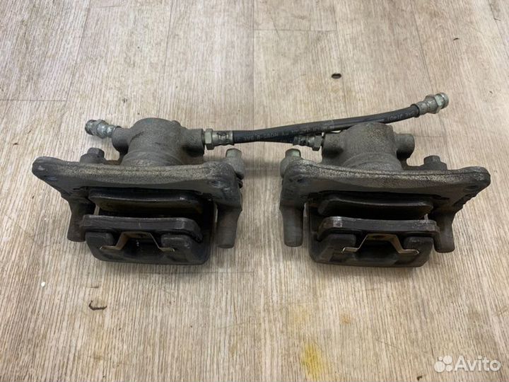 Суппорта и диски задняя Mitsubishi Lancer 10 CY3A