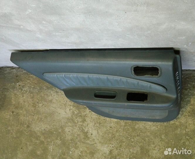 Обшивка двери задней левой Maxima A32