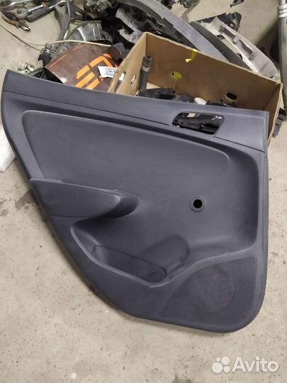 Обшивка двери задней левой hyundai solaris