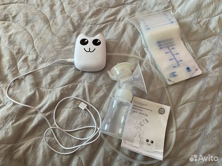 Молокоотсос электрический новый