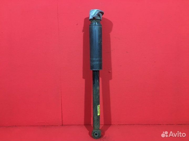 Амортизатор задний Opel Astra J A16XER 1.6 ecotec