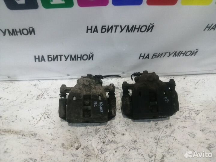 Тормозной суппорт передний Mitsubishi Colt