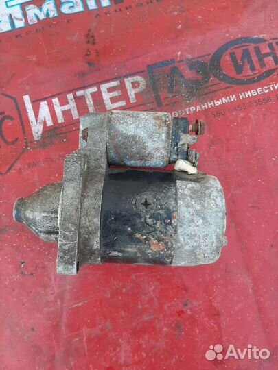 Стартер Мазда 323 1,5л 1999г
