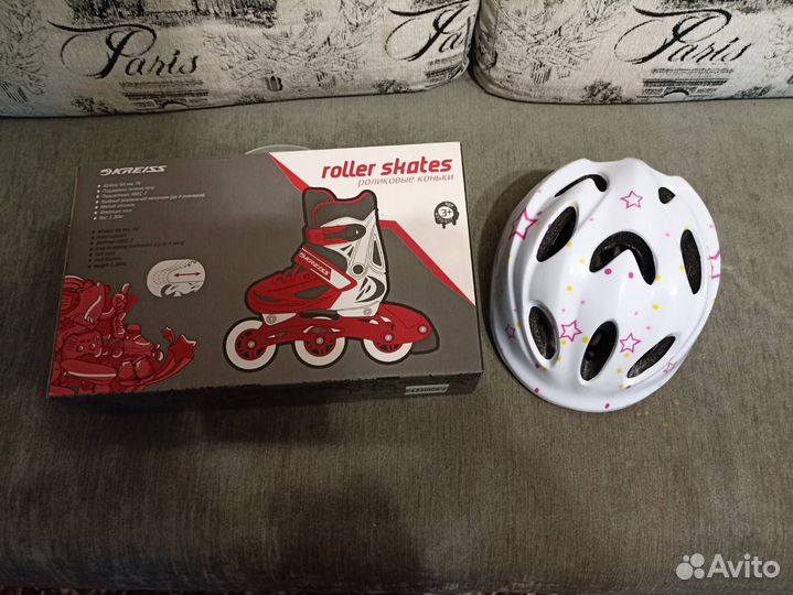 Роликовые коньки