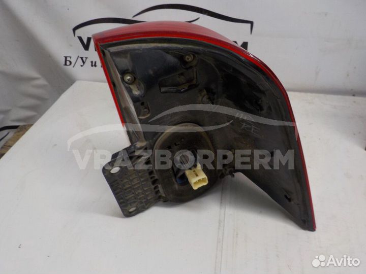 Фонарь задний левый наружный (в крыло) Toyota Land