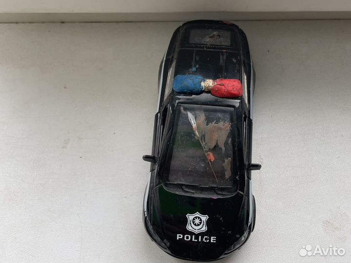 Полицейская машина игрушка