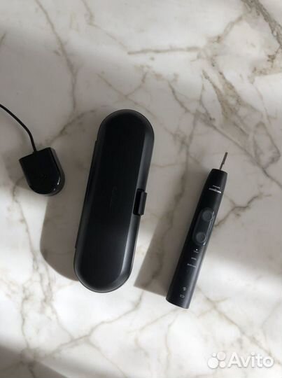 Электрическая зубная щетка philips
