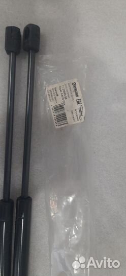 Амортизатор задней двери Opel Astra