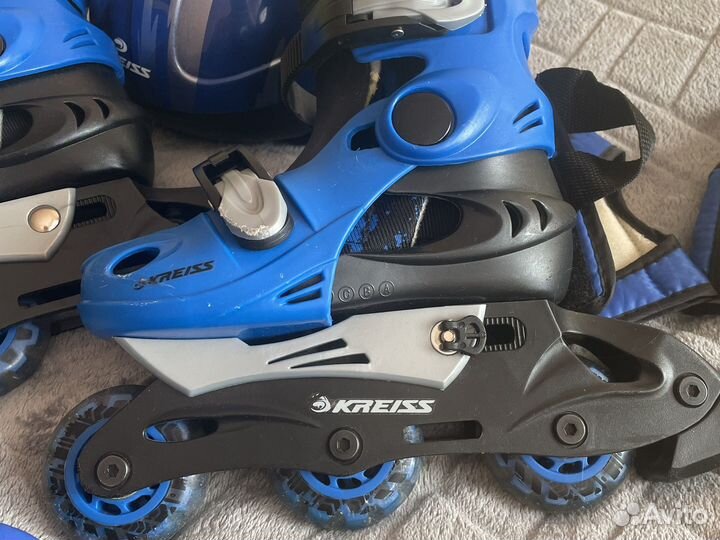 Роликовые коньки