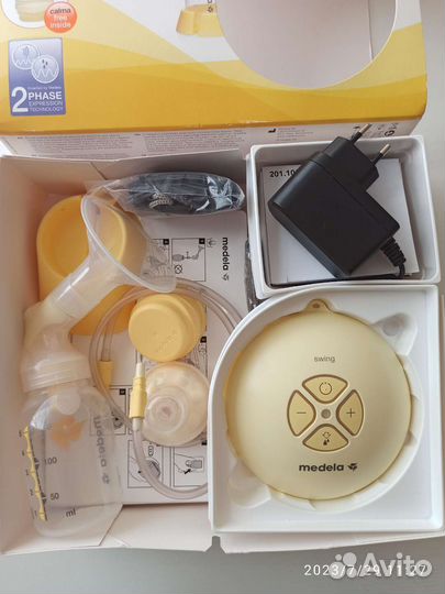 Молокоотсос medela swing электрический