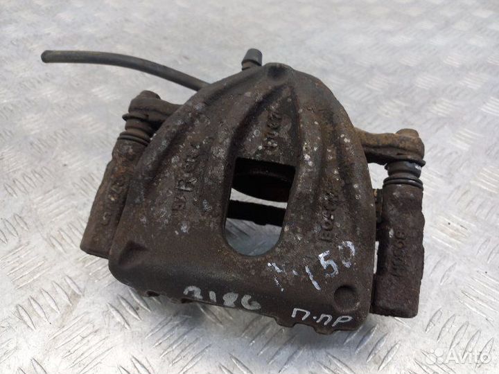 Суппорт передний правый Toyota Avensis T250 1.6