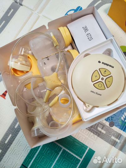 Двойной молокоотсос swing maxi medela +calma