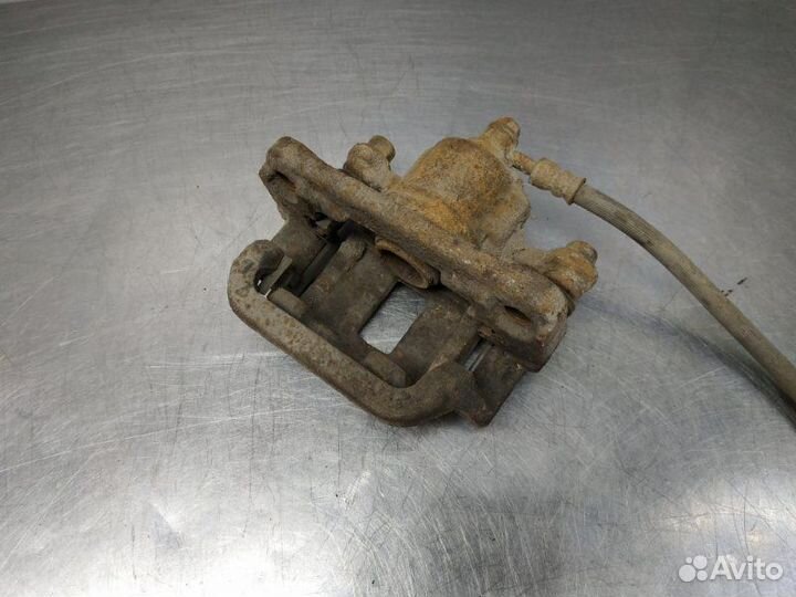 Суппорт задний левый Nissan X-Trail T31 MR20DE