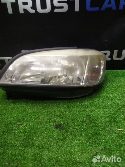 Фара галогеновая передняя левая Opel Zafira