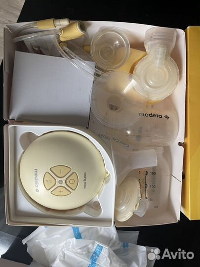 Молокоотсос medela электрический swing maxi