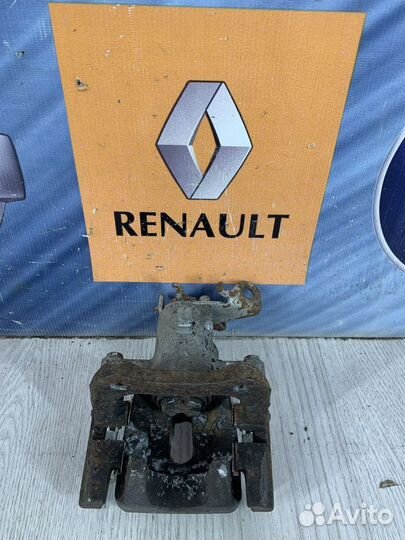 Суппорт тормозной задний Renault fluence Лев