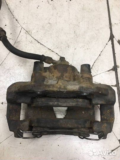 Суппорт тормозной передний левый Opel Vectra