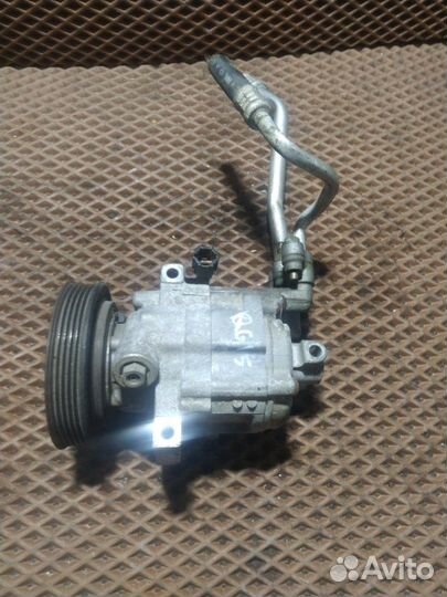 Компрессор кондиционера Nissan Wingroad WFY11