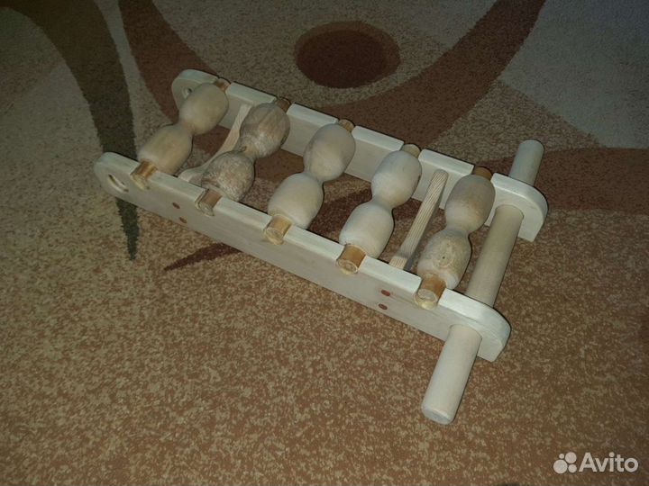 Массажер для спины из пяти роликов