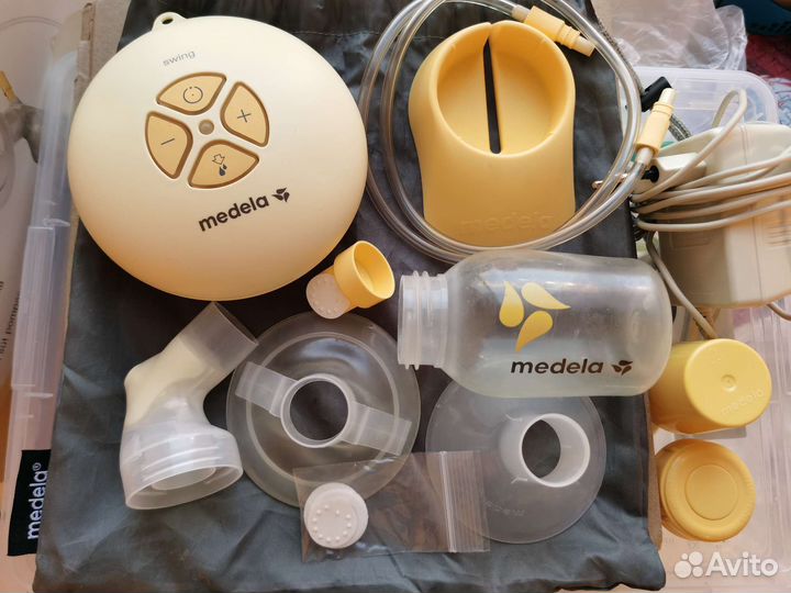 Молокоотсос medela swing электрический