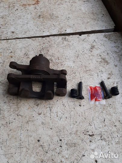 Суппорт левый деу матиз,шевроле спарк