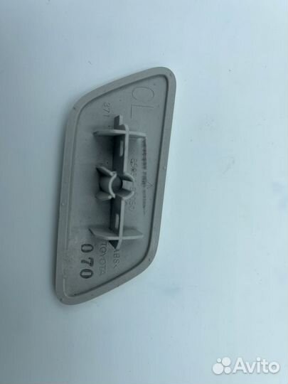 Крышка форсунки омывателя фар LC 200 левая 12-15