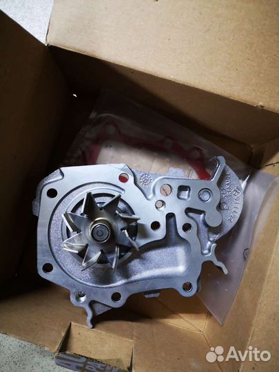 Помпа renault logan