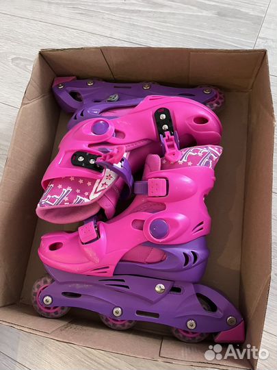 Роликовые коньки