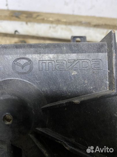 Mazda CX 7 полка под аккумулятора