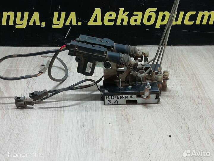 Замок двери задний Chevrolet Niva 2123