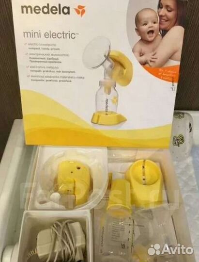 Молокоотсос medela электрический