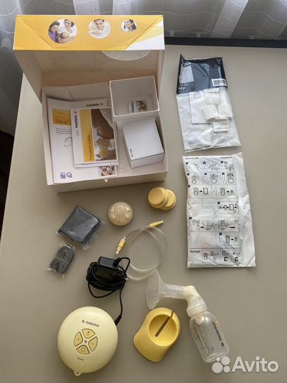 Молокоотсос medela swing электрический