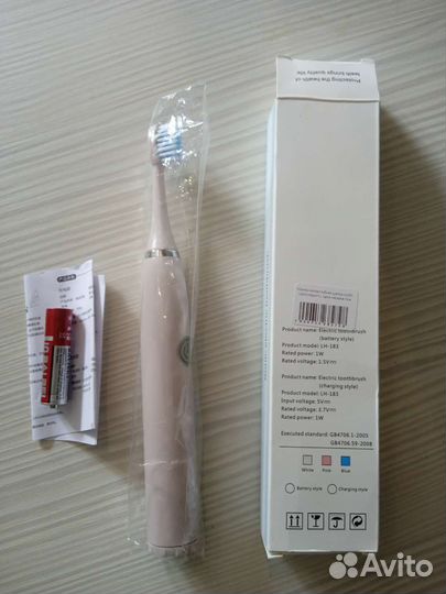 Электрическая зубная щетка новая